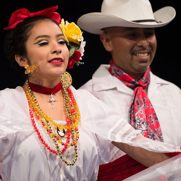 Two dancers smiling